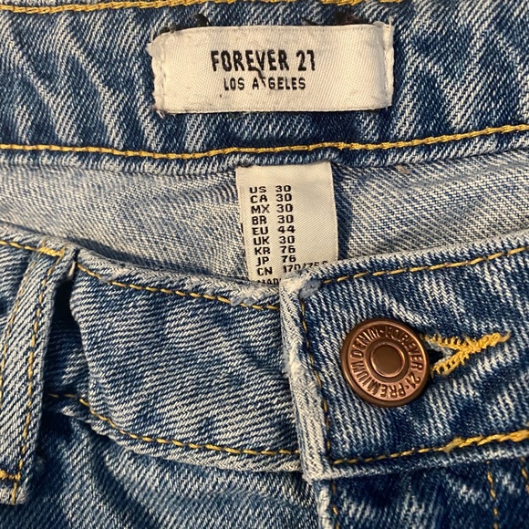 Ripped Blue Jeans - Picture 4 of 5